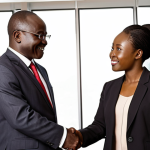 **

A confident business professional shaking hands with an African counterpart in a modern office setting. Focus on conveying a successful business deal and strong cross-cultural communication. The image should radiate opportunity and global partnership. Use elements like flags of China and an African country subtly in the background.

**